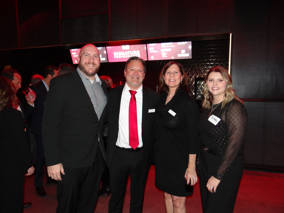 Signature Performance leaders attending a formal company event